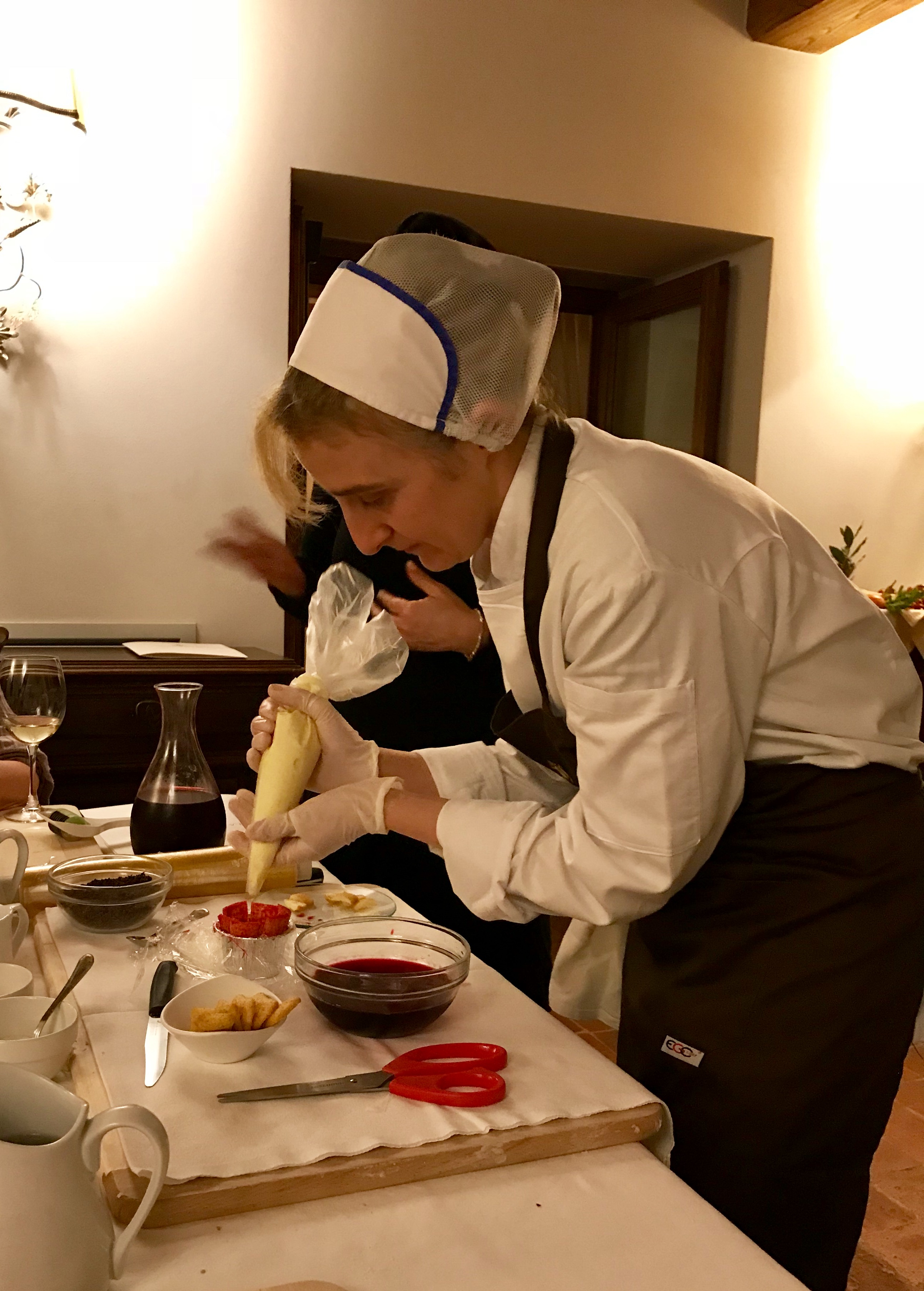 The pasty chef demonstrating dessert...